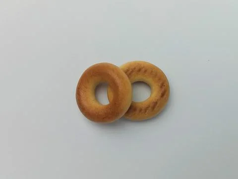 Two bagels on white background Stock Photos