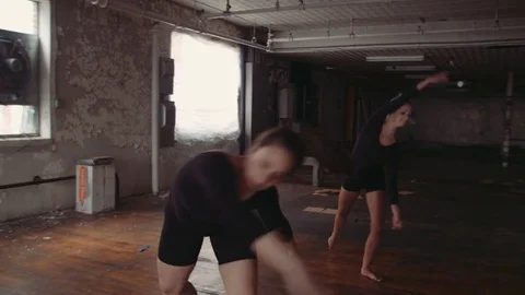 Two Ballerinas Dance in Unison Stock Footage 81631605