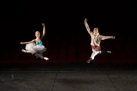 Two ballet dancers jumping. Stock Photos