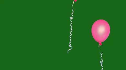 Two balloons flying on a green screen Stock Footage 311754062