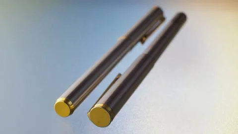 Two ballpoint pens on glass table Stock Footage 140325585