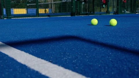 Two balls bounce in front of the camera. Stock Footage 162693736