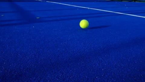Two balls bouncing on a paddle tennis court Stock Footage 162167019