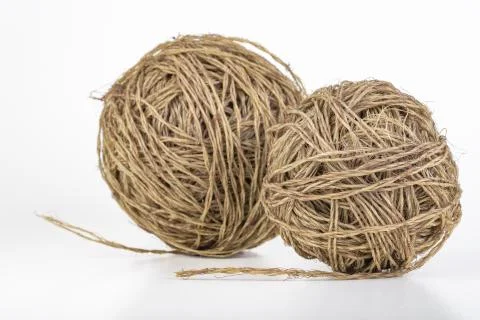 Two balls of coiled string for gardening. Cord for tying plants. 스톡 사진