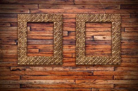 Two bamboo frames on wood wall Stock Illustration