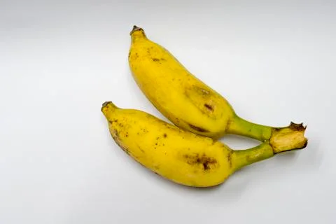 Two bananas ripened on a white background. Foto stock