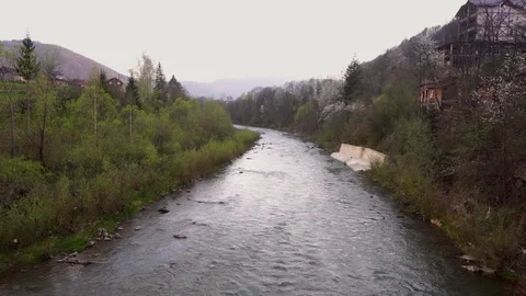 Two banks of Fresh cold mountain river village beautiful landscape 스톡 동영상 114005191