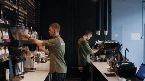 Two Baristas Preparing Modern Cafeteria – Wiping Equipment and Surfaces Stock-Footage 307574464