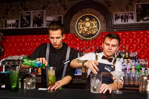 Two bartenders working Stock Photos