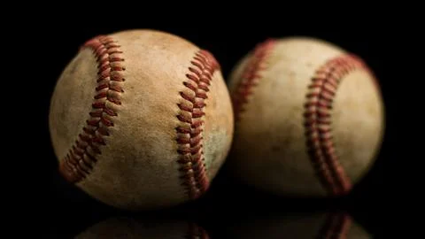 Two Baseball Balls On Black Background Stock Photos