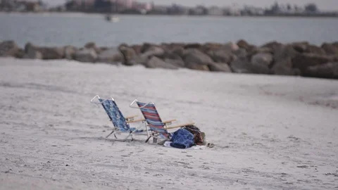 Two beach chairs on beach 動画素材 112235295
