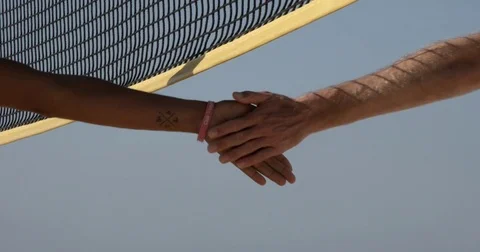 Two Beach Volleyball Players 'Five' Each Other. Vídeo Stock 79823130