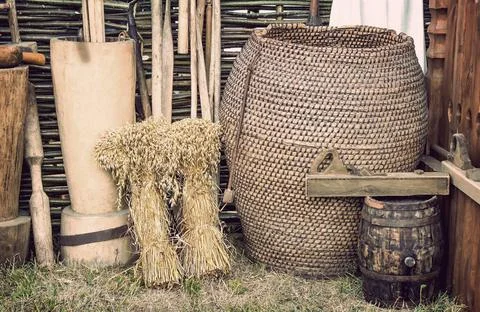 Two beams and ancient objects of rural life. Near ancient objects of rural... Stock Photos
