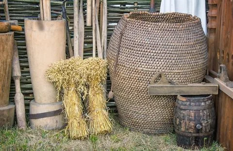 Two beams and ancient objects of rural life. Near ancient objects of rural... Stock Photos