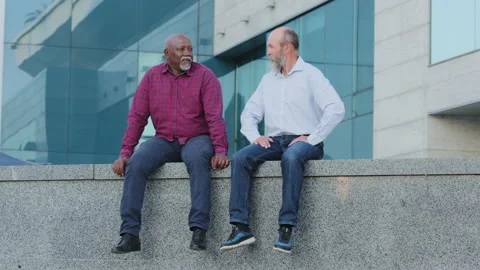 Two bearded men of retirement age, elderly male friends old colleagues or mature Stock Footage 163478288