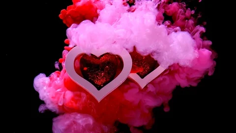 Two beautiful hearts on a beautiful red-pink background Video stock 121991573