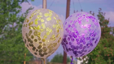 Two beautiful multi-colored balls on parade close-up Stock Footage 102724079