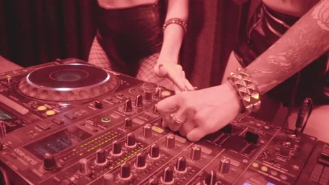 Two beautiful sexy disco dj women in bikinis performing in a club setting Video stock 135249341