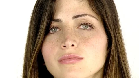 Two beautiful women extreme closeup looking camera serious showing power Stock Footage 74391553