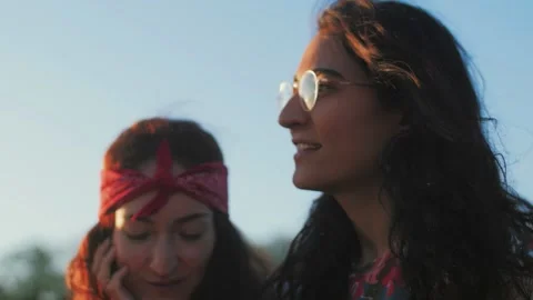 Two beautiful women posing for the camera. Stock Footage 132203506