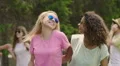 Two beautiful young ladies dancing, laughing and posing for selfie on smartphone HD Footage