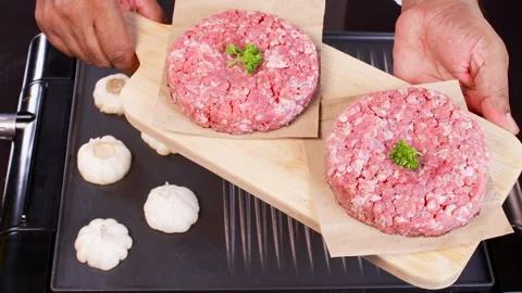 Two Beef Burger Patties served Stock Footage 248745214