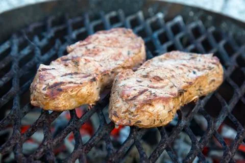 Two beefs on the barbecue Stock Photos