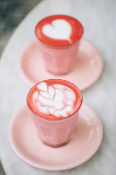Two beetroot lattes Stock Photos