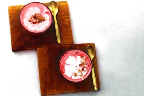 Two Beetroot super latte on marble background. Stock Photos