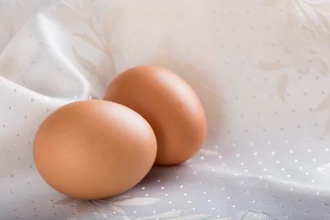 Two beige eggs 스톡 사진