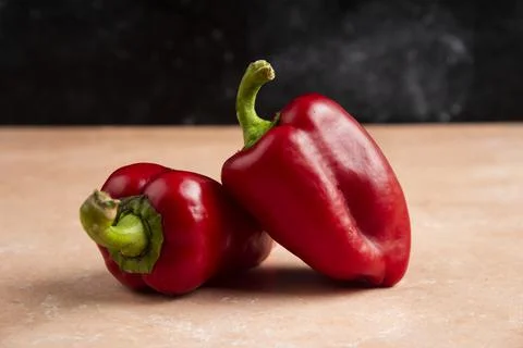 Two Bell Fresh red pepper on sacking background Stock Photos