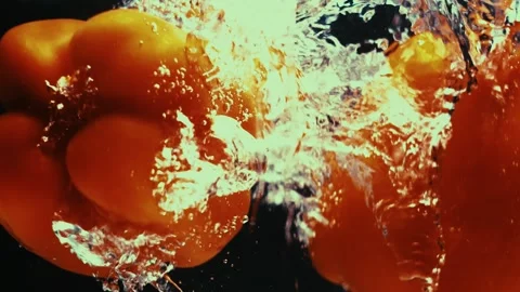 Two Bell Pepper Fall Underwater Stock Footage 300892807