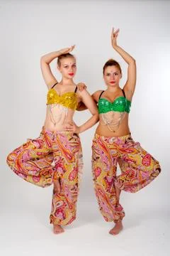 Two belly dancers Stock Photos