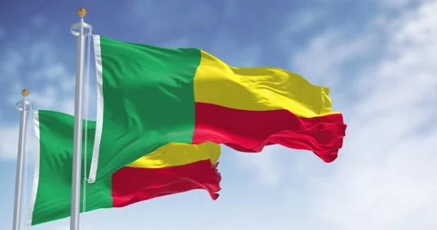 Two Benin national flags waving on a clear day Stock Footage 287744629