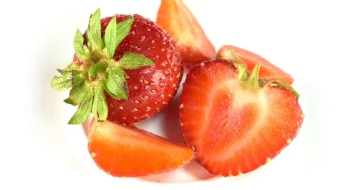 Two berry strawberries lie on a white background Stock Footage 82203478