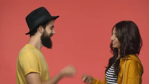 Two best friends trying decide who will treat dinner. Middle-eastern bearded guy Stock Footage 115781270
