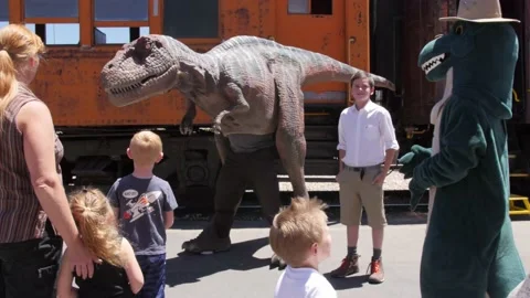 Two big dinosaurs are playing with the tourists Stock-Footage 141877496