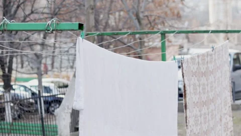 Two big size blankets dries outside Stock Footage 166583690