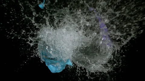 Two big water balloon exploding Stock Footage 56813207