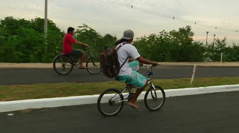 Two bikers ride along with camera (PoAbikes28) Video stock 23733592