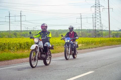 Two bikers on the road Stock Photos