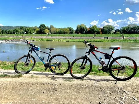 Two bikes bu the river Stock Photos