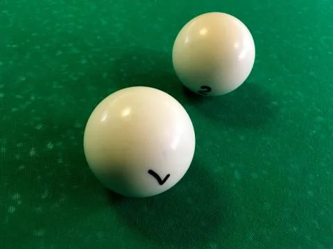 Two billiard balls on the table Stock Photos