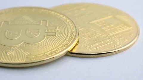 Two bitcoin BTC coins on white background, close-up shot. Blockchain technology Stock Footage 170853616