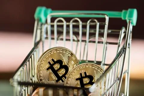 Two bitcoin currency shopping concept Stock Photos