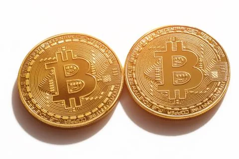 Two bitcoins on a white background Stock Photos