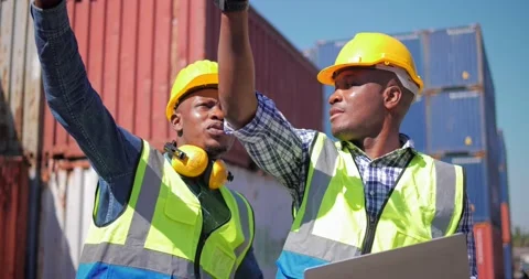 Two black African man engineer control checking container from cargo  스톡 동영상 170830745