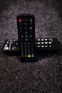 Two Black appliances remote control showcasing sleek design Stock Photos