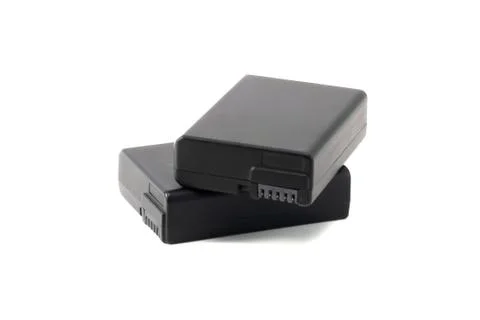 Two black batteries camera Stock Photos