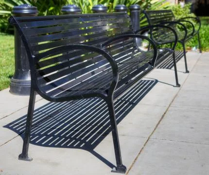 Two black benches in hdr Stock Photos